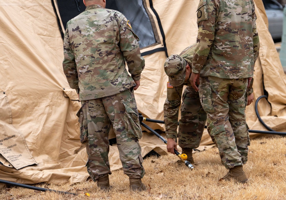 The Headquarters team from the 25th Transportation Battalion honed their skills, conducting a training exercise focused on setting up their main operations tent on Feb. 26.