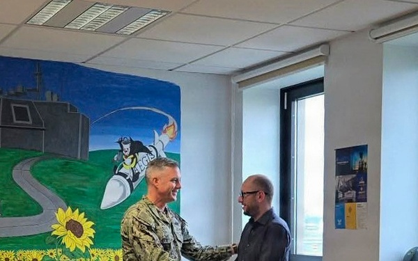 NAVFAC EURAFCENT CO Presents Coins at ROICC Deveselu