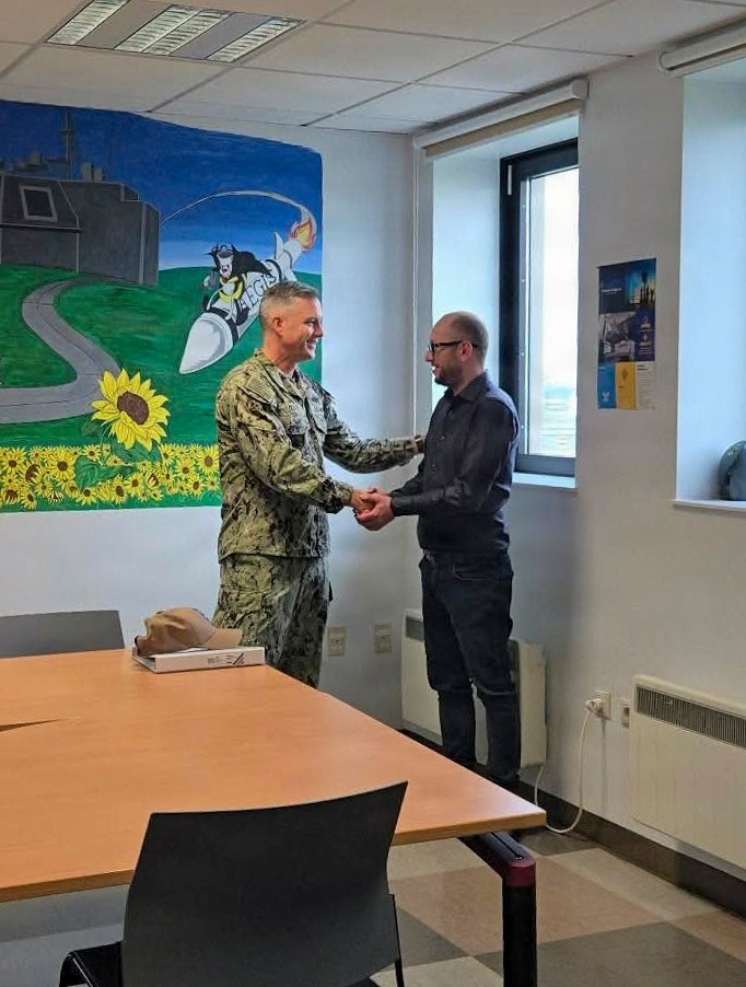 NAVFAC EURAFCENT CO Presents Coins at ROICC Deveselu