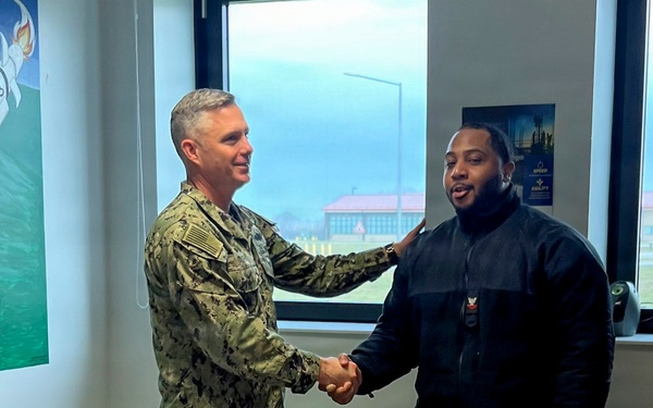 NAVFAC EURAFCENT CO Presents Coins at ROICC Deveselu