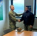NAVFAC EURAFCENT CO Presents Coins at ROICC Deveselu