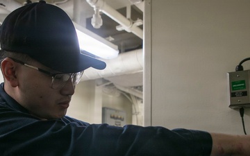 USS Tripoli Sailors Conduct Electrical Maintenance