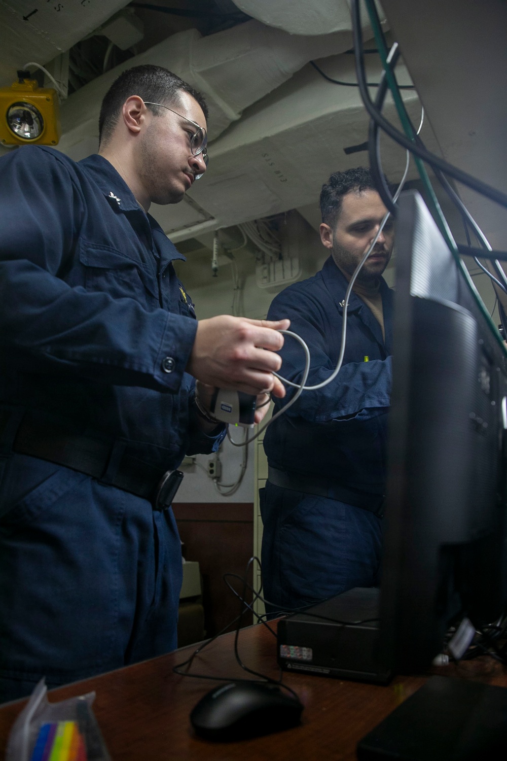 USS Tripoli Sailors Conduct Electrical Maintenance