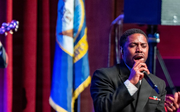 Musician 1st Class Jessie Nunn of the US Navy Band Sea Chanters performs at the Sanford Performing Arts Center