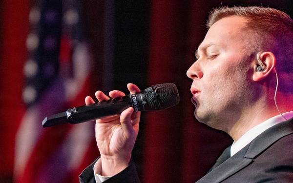 Musician 1st Class Nate Buttram of the US Navy Band Sea Chanters performs at the Sanford Performing Arts Center