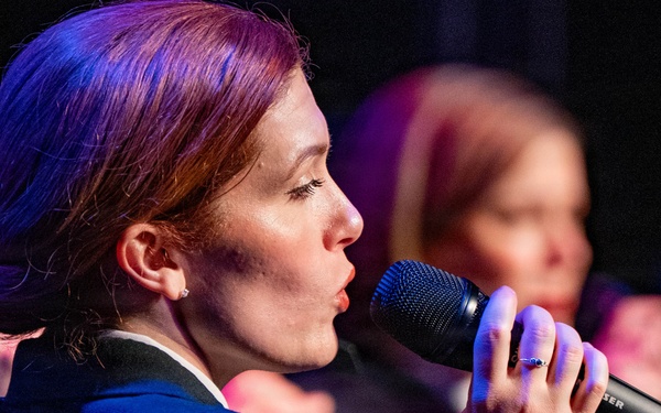 Musician 1st Class Madilyn Crossland of the US Navy Band Sea Chanters performs at the Sanford Performing Arts Center