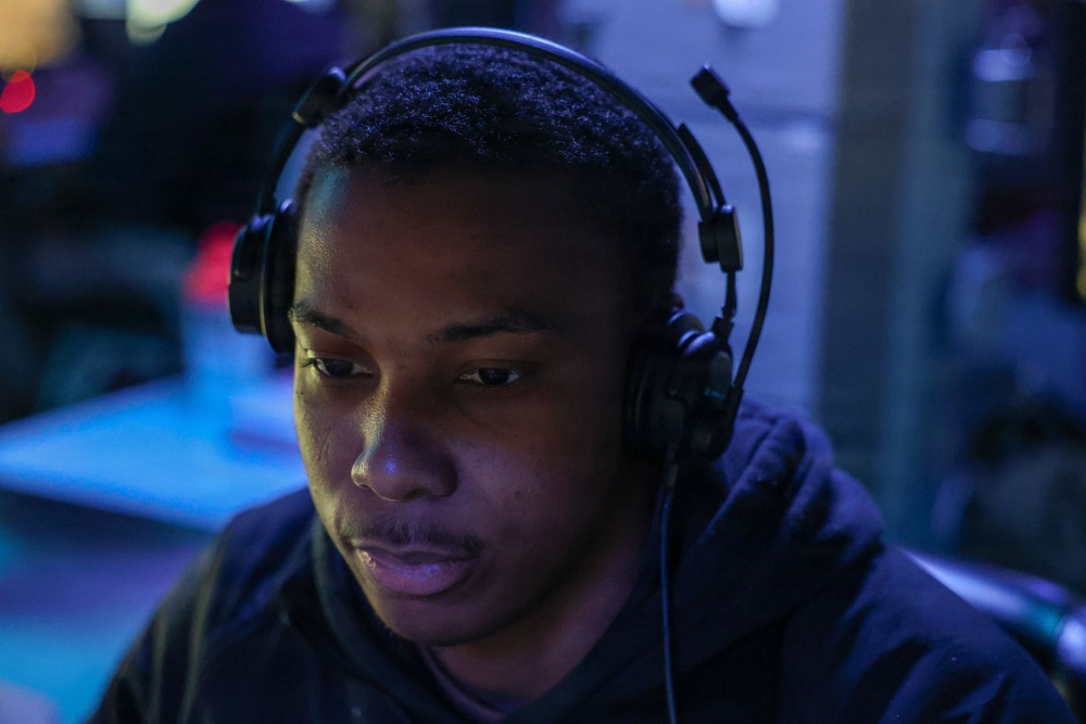 Sailors aboard the USS John Finn stand watch during Operation Epic Fury