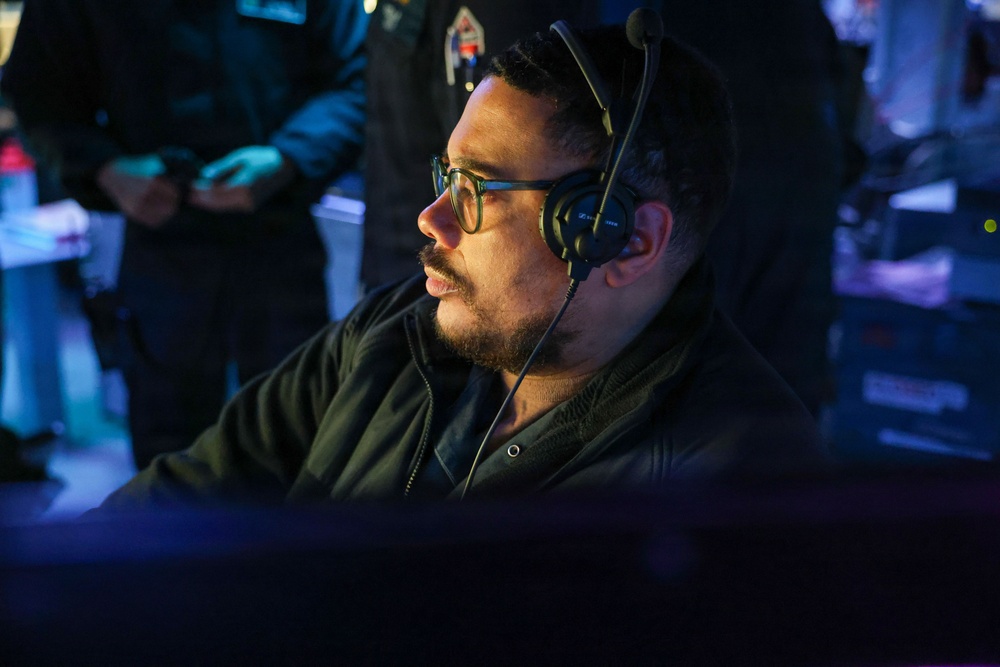 Sailors aboard the USS John Finn stand watch in the U.S. Central Command area of responsibility