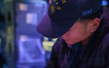 Sailors aboard the USS John Finn stand watch in the U.S. Central Command area of responsibility