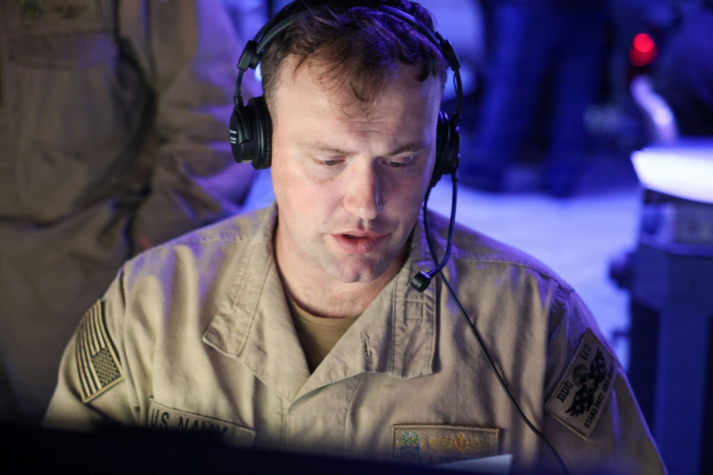 Sailors aboard the USS John Finn stand watch in the U.S. Central Command area of responsibility