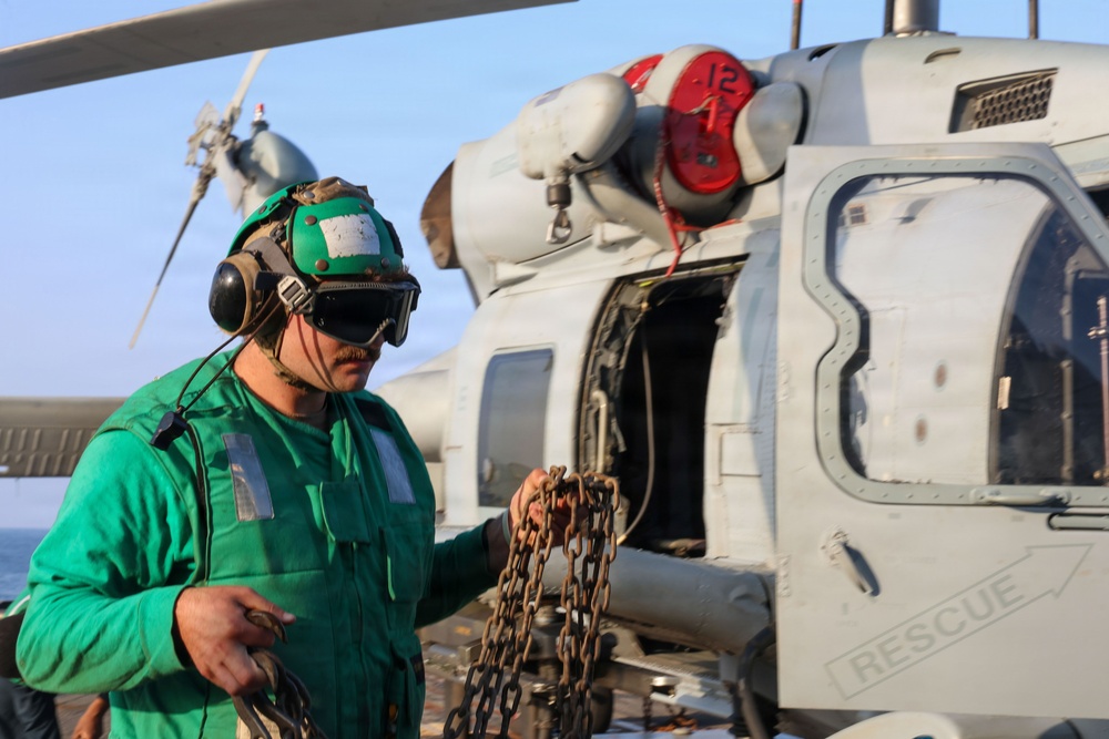 Sailors aboard the USS John Finn conduct flight quarters in the U.S. Central Command area of responsibility