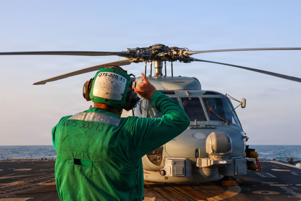 Sailors aboard the USS John Finn conduct flight quarters in the U.S. Central Command area of responsibility