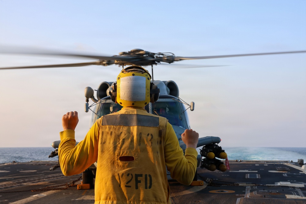 Sailors aboard the USS John Finn conduct flight quarters in the U.S. Central Command area of responsibility