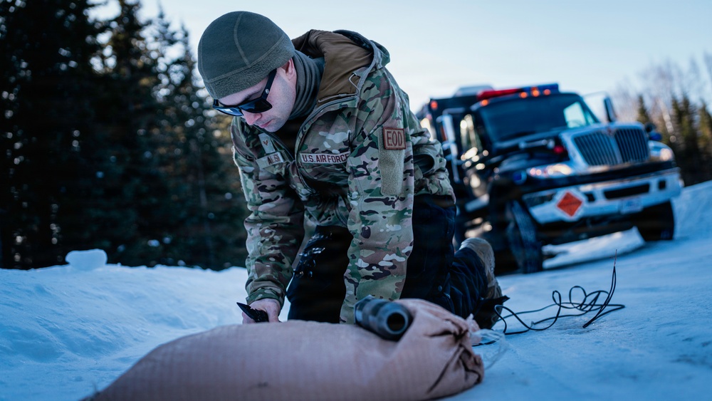 US Navy, Air Force EOD technicians dispose of UXO