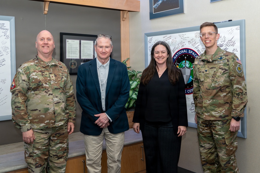 S4S and Space Delta 15/NSDC leadership stand with Jonathon Epstein, Senate Armed Services Committee professional staff member, second from left, and Kristina Belcourt, Senate Armed Services Committee professional staff member.