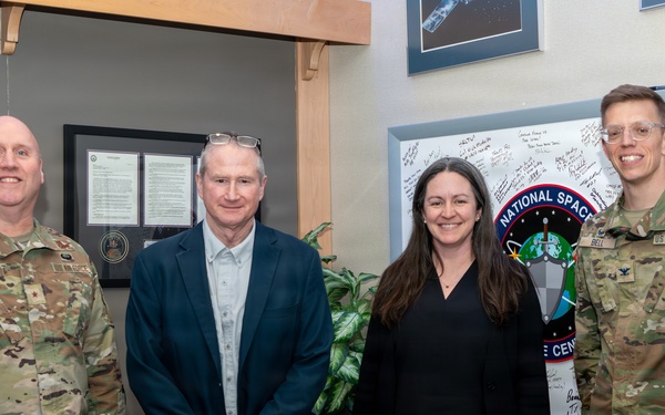 S4S and Space Delta 15/NSDC leadership stand with Jonathon Epstein, Senate Armed Services Committee professional staff member, second from left, and Kristina Belcourt, Senate Armed Services Committee professional staff member.