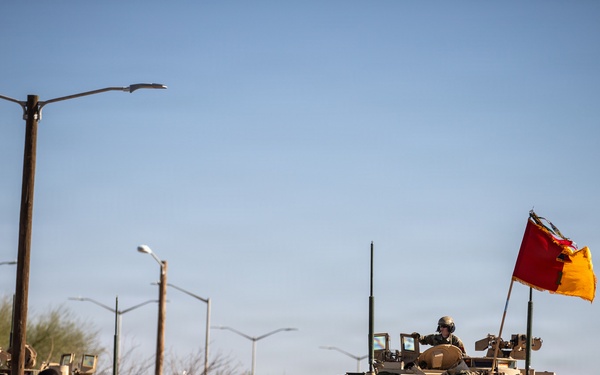 A test of strength: 1st Armored Division Soldiers pull tanks to glory