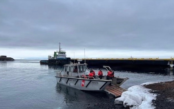 USCGC Polar Star (WAGB 10) supports the installation of a pier in McMurdo Station during Operation Deep Freeze 2026