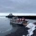 USCGC Polar Star (WAGB 10) supports the installation of a pier in McMurdo Station during Operation Deep Freeze 2026