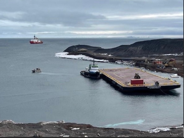 USCGC Polar Star (WAGB 10) supports the installation of a pier in McMurdo Station during Operation Deep Freeze 2026
