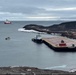 USCGC Polar Star (WAGB 10) supports the installation of a pier in McMurdo Station during Operation Deep Freeze 2026