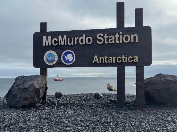 USCGC Polar Star (WAGB 10) supports the installation of a pier in McMurdo Station during Operation Deep Freeze 2026