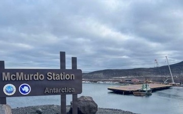 USCGC Polar Star (WAGB 10) supports the installation of a pier in McMurdo Station during Operation Deep Freeze 2026