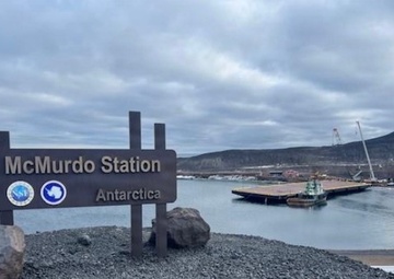 USCGC Polar Star (WAGB 10) supports the installation of a pier in McMurdo Station during Operation Deep Freeze 2026