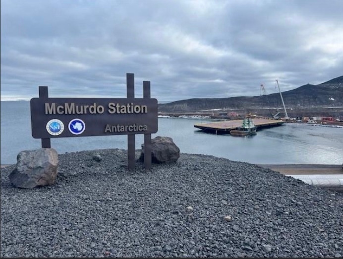 USCGC Polar Star (WAGB 10) supports the installation of a pier in McMurdo Station during Operation Deep Freeze 2026