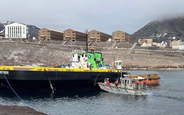 USCGC Polar Star (WAGB 10) supports the installation of a pier in McMurdo Station during Operation Deep Freeze 2026
