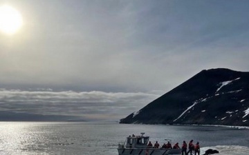 USCGC Polar Star (WAGB 10) supports the installation of a pier in McMurdo Station during Operation Deep Freeze 2026