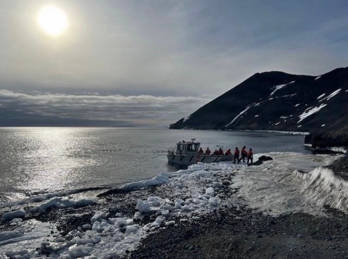 USCGC Polar Star (WAGB 10) supports the installation of a pier in McMurdo Station during Operation Deep Freeze 2026
