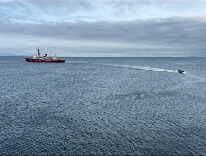 USCGC Polar Star (WAGB 10) supports the installation of a pier in McMurdo Station during Operation Deep Freeze 2026