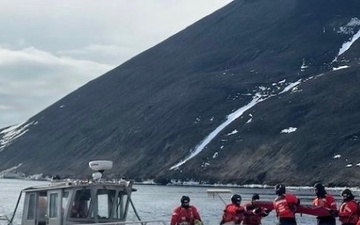 USCGC Polar Star (WAGB 10) supports the installation of a pier in McMurdo Station during Operation Deep Freeze 2026