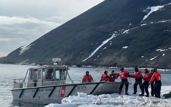 USCGC Polar Star (WAGB 10) supports the installation of a pier in McMurdo Station during Operation Deep Freeze 2026