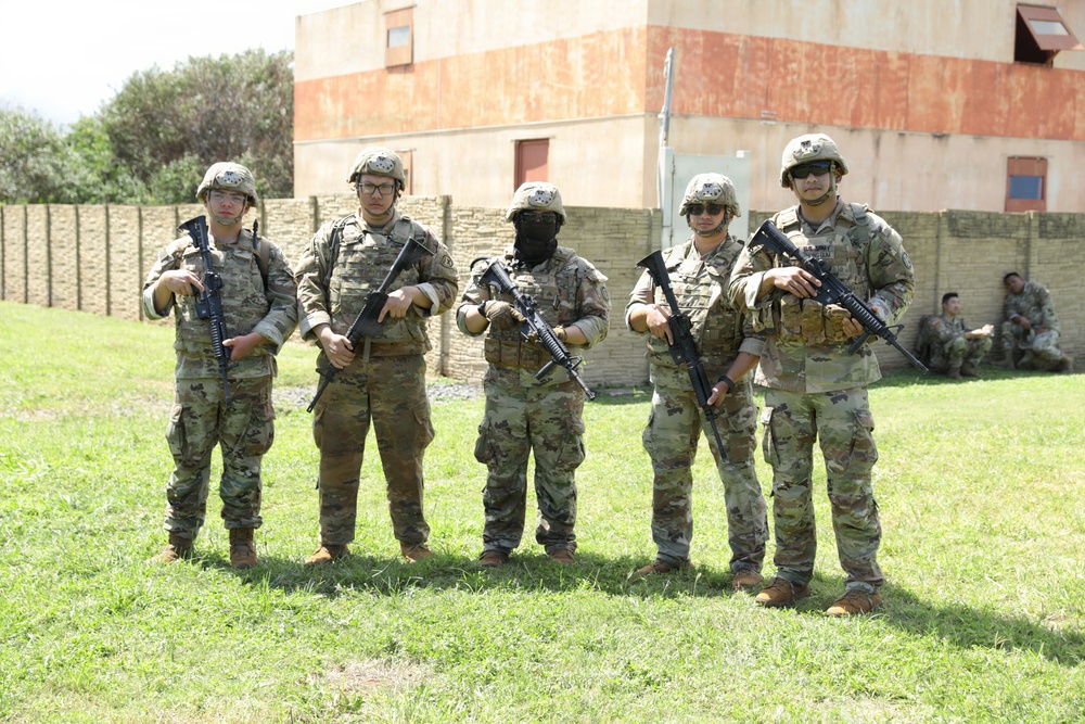 Soldiers react to contact during Best Squad