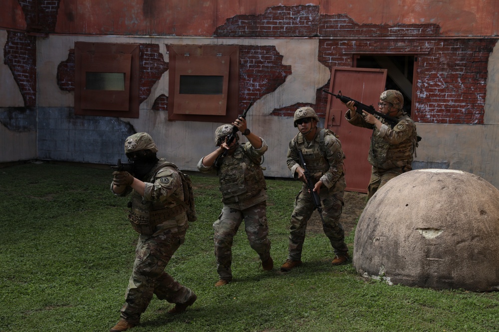 Soldiers react to contact during Best Squad