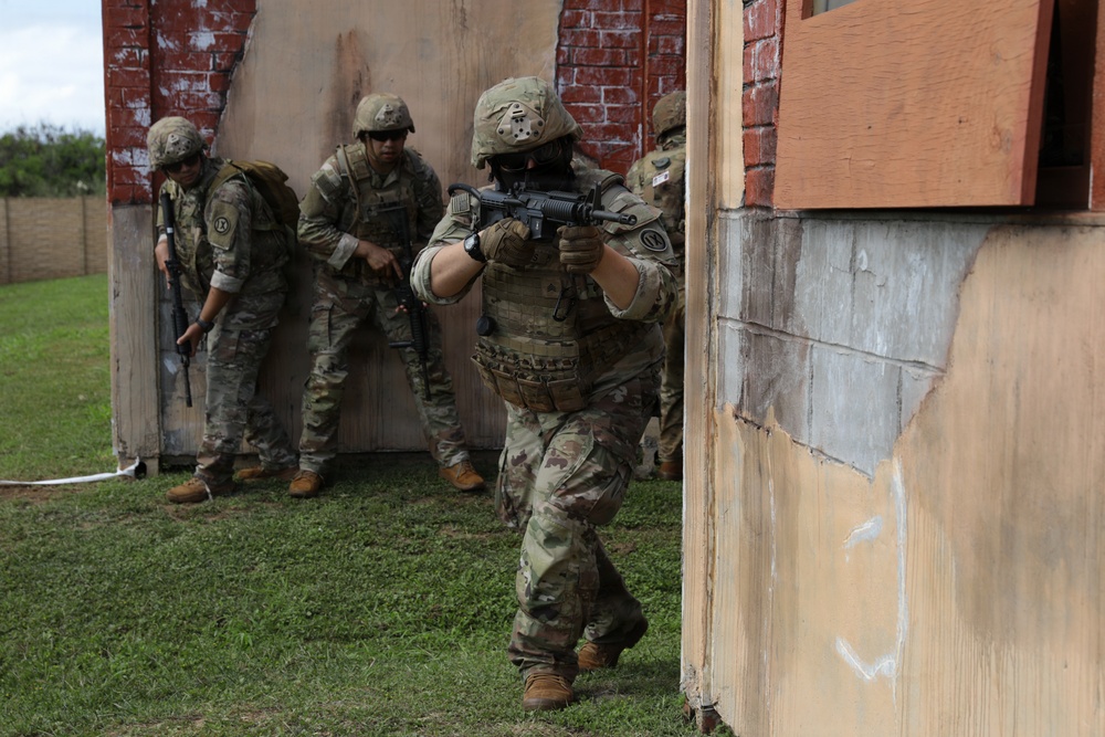 Soldiers react to contact during Best Squad