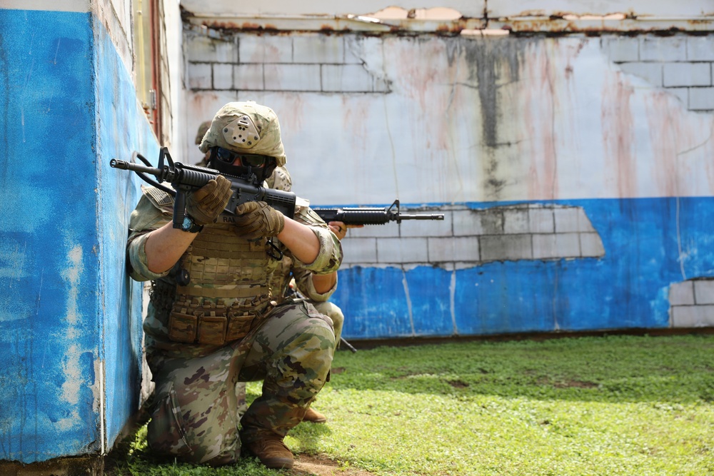 Soldiers react to contact during Best Squad