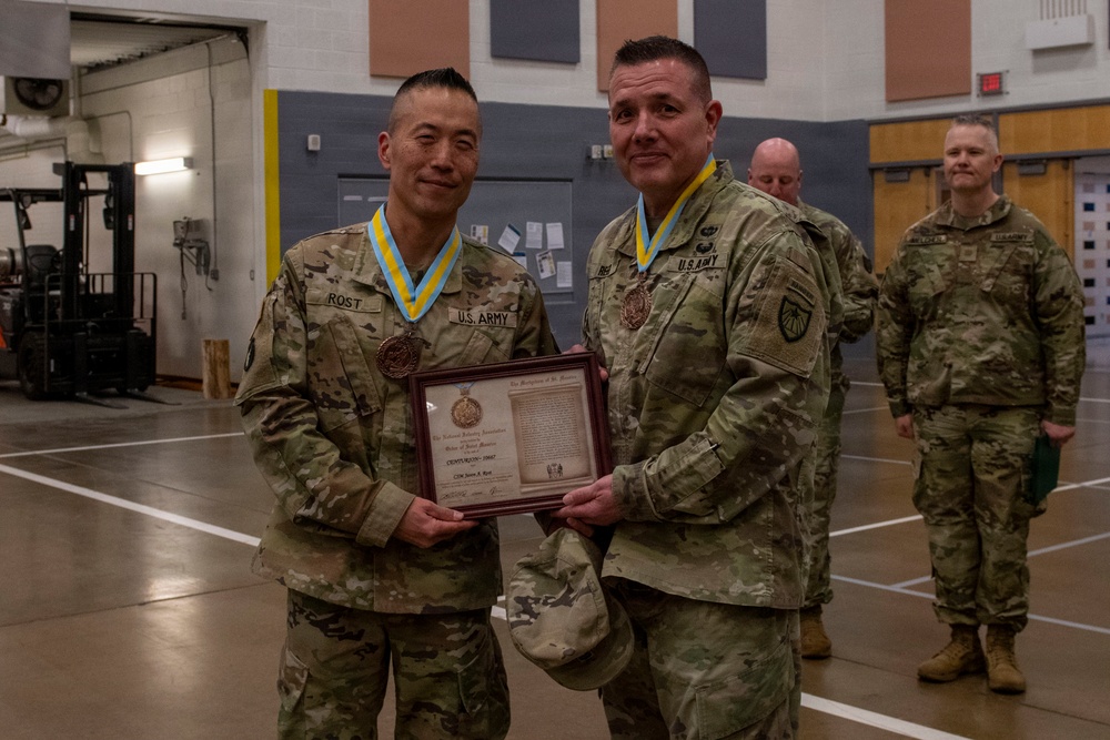 Command Sgt. Maj. Jason Rost is inducted to The Order of Saint Maurice