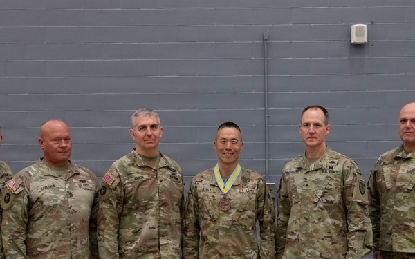 Command Sgt. Maj. Jason Rost is inducted to The Order of Saint Maurice