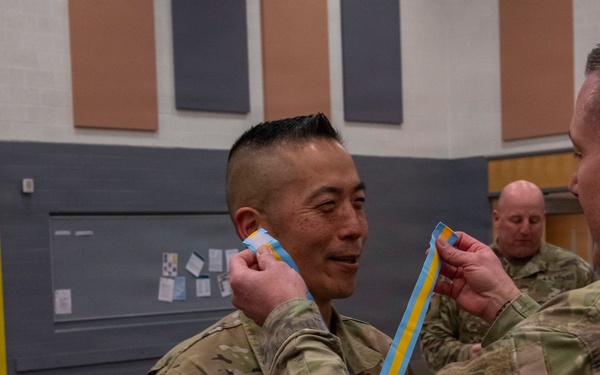 Command Sgt. Maj. Jason Rost is inducted to The Order of Saint Maurice