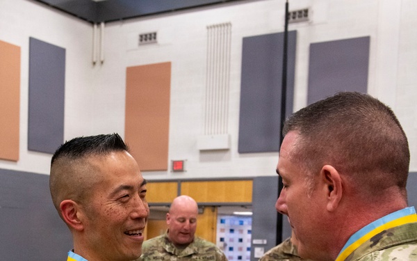 Command Sgt. Maj. Jason Rost is inducted to The Order of Saint Maurice
