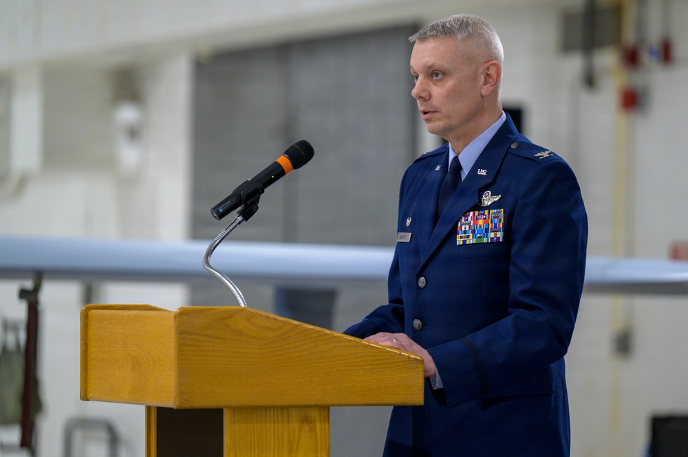 Col. Keith Walker speaks during 174th Operations Group change of command