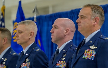 174th Attack Wing leaders stand at attention during change of command ceremony