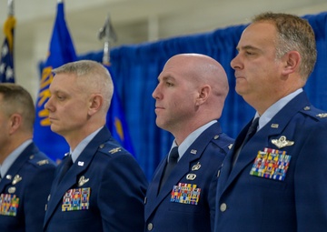 174th Attack Wing leaders stand at attention during change of command ceremony