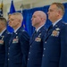 174th Attack Wing leaders stand at attention during change of command ceremony