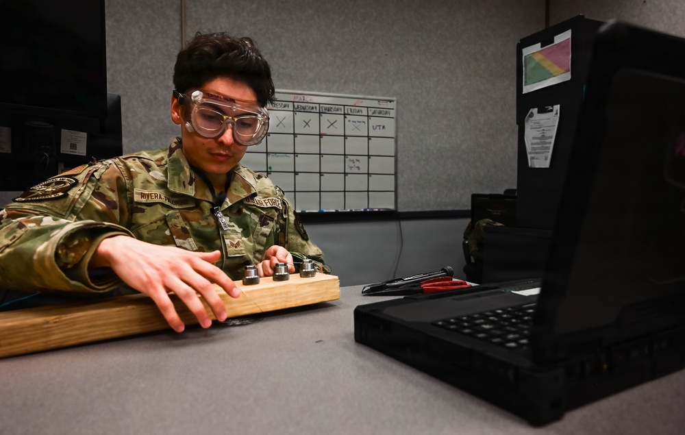 513th Maintenance Squadron Airmen practice safety wiring