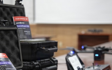 2nd Infantry Division, 2nd Stryker Brigade Combat Team briefs Lt. Gen. Mcfarlane on the new DroneGuard 100 system set to be used for training during FS 26