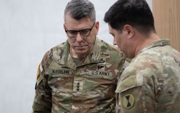 2nd Infantry Division, 2nd Stryker Brigade Combat Team briefs Lt. Gen. Mcfarlane on the new DroneGuard 100 system set to be used for training during FS 26&amp;#xD;&amp;#xA;